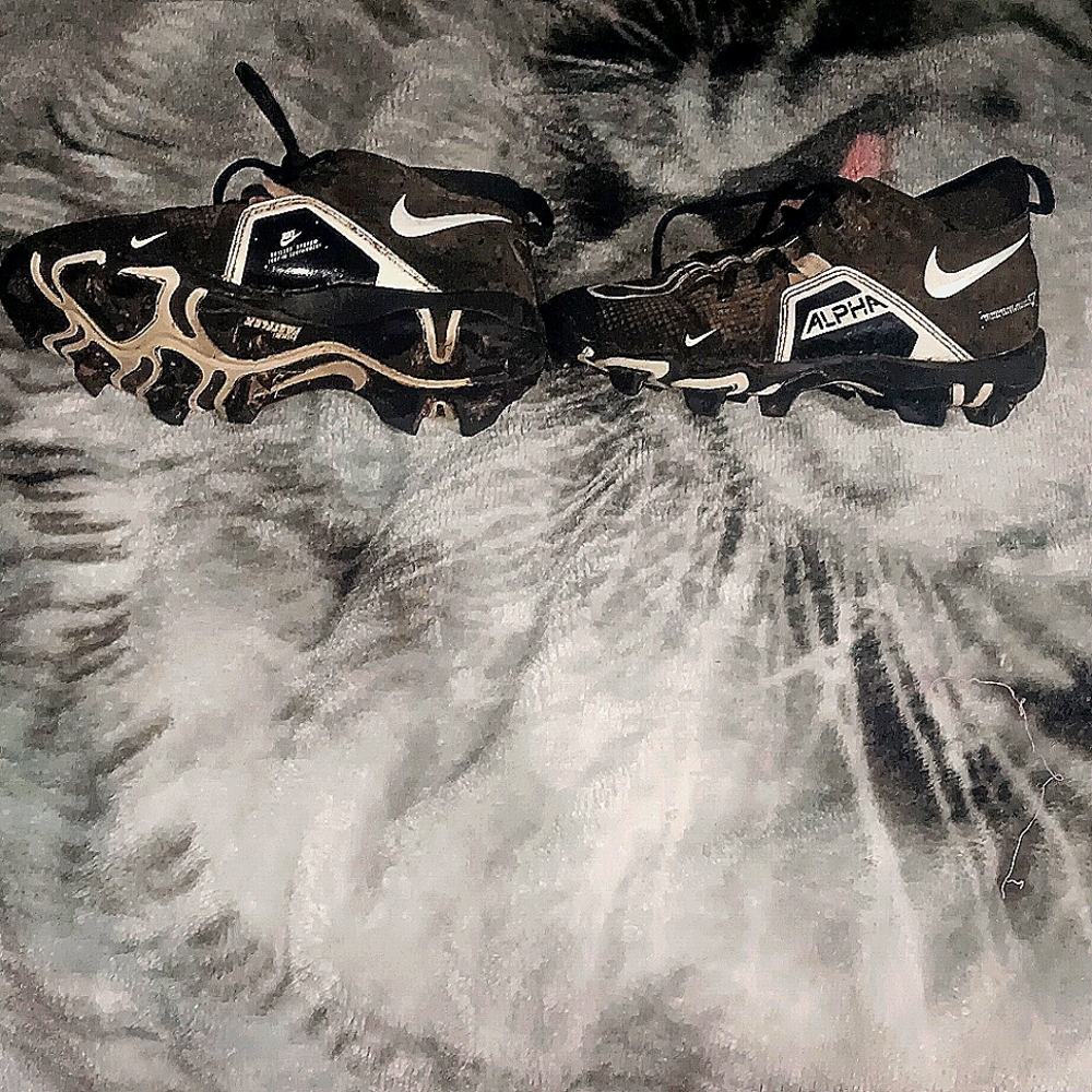 Black and white, alpha cleats
